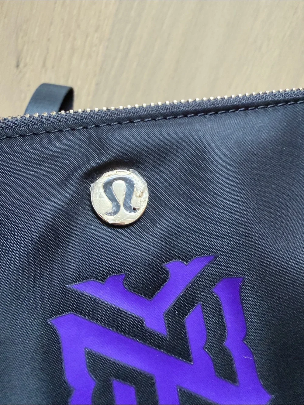 NWT Lululemon Black Wristlet Pouch with NYU logo